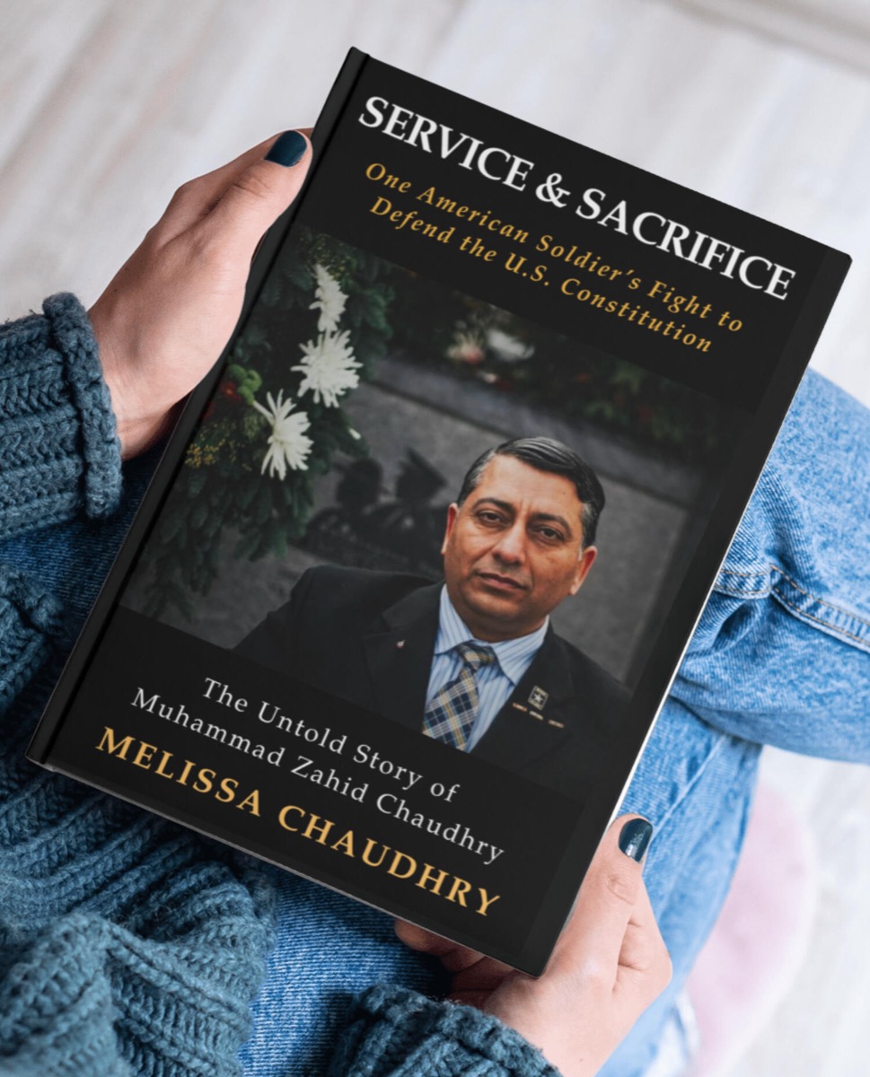 Service & Sacrifice book cover, held up, showing a portrait of Muhammad Zahid Chaudhry in dress uniform.